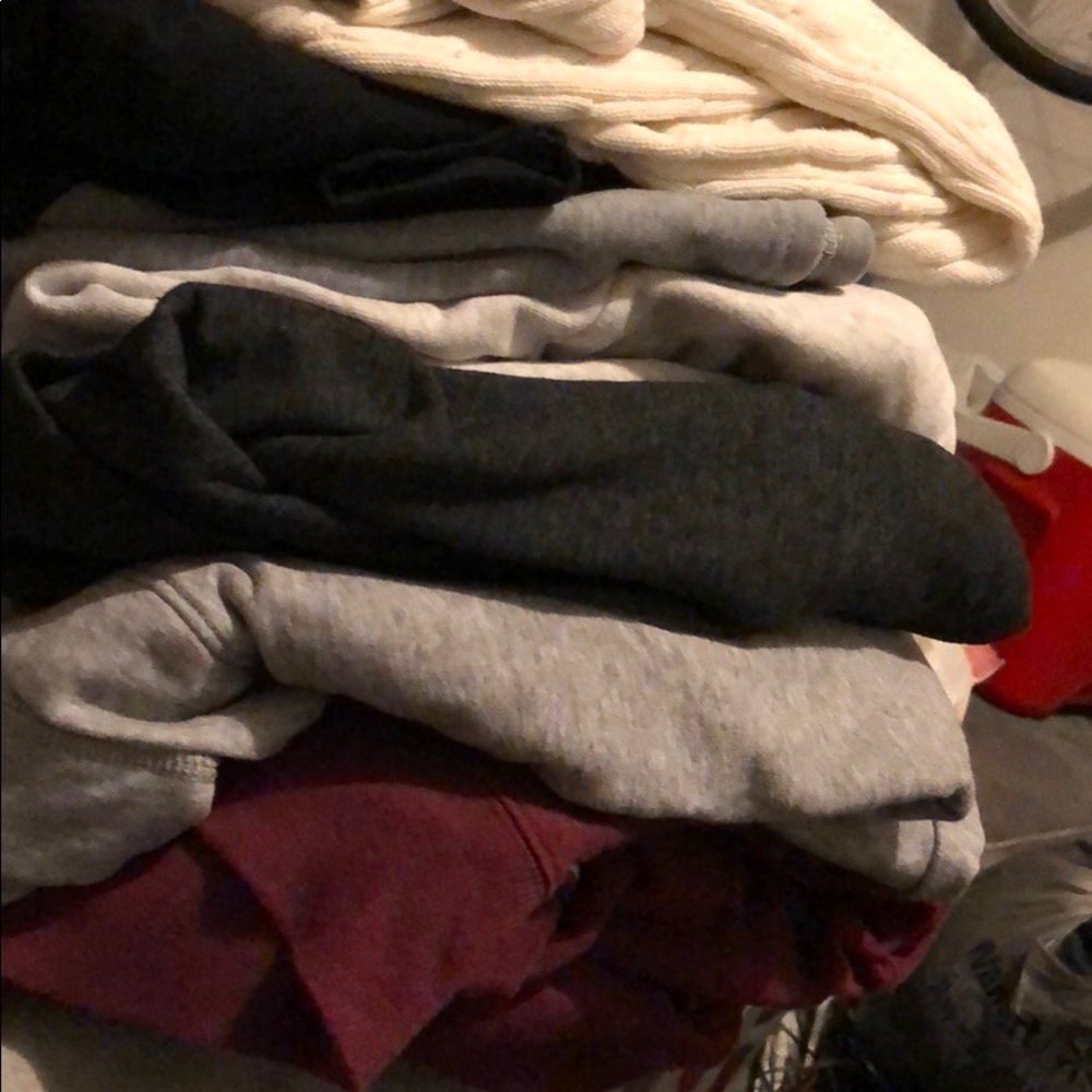 8 sweaters, selling as a set.